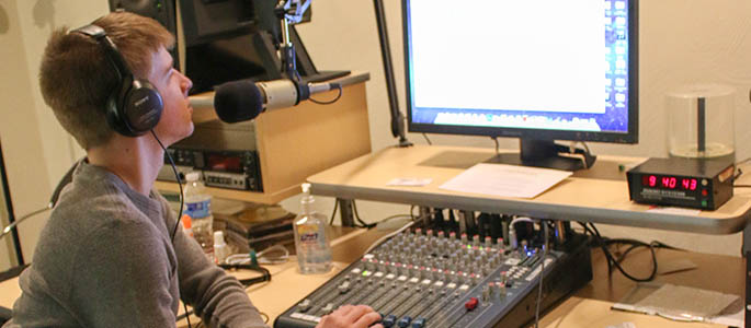 A high school student in the WPPJ recording studio at the spring media workshop. Photo | Victoria A. ikula