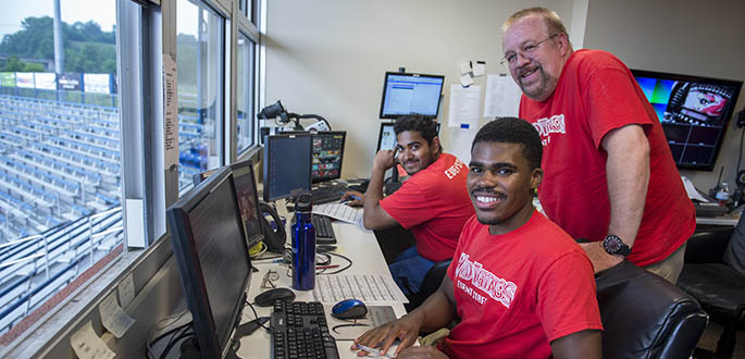 School of Communication students Blaine King and Don Noel Ranasinghe are interns for the Washington Wildthings. Photo | Christopher Rolinson