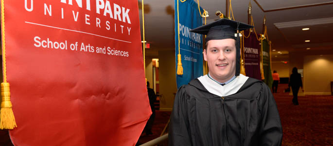 Pictured is Theodore DeAngelis, M.A. in intelligence and global security graduate. | Photo by Chris Rolinson