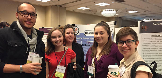 Kris Chandler, Beth Turnbull, Sarah Martin, Nicolette Jones and Autumn Barszczowski attend the final poster session at the National Regional Honors Conference in Pittsburgh. Submitted photo