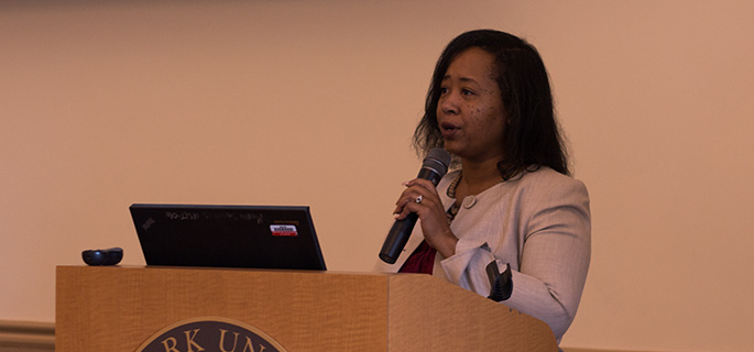 Pictured is Ph.D. in community engagement student Danielle Davis speaking at the Pittsburgh Collective Community Impact Forum. | Photo by Annie Brewer