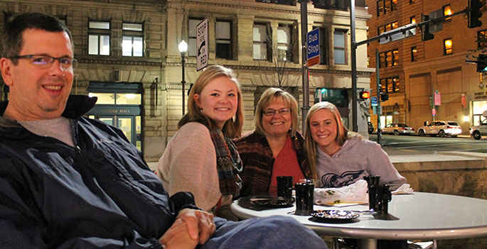 A Point Park student and her mother enjoy a cup of hot chocolate in the University's Village Park during Family Weekend, October 2015. | Photo by Samantha Exler