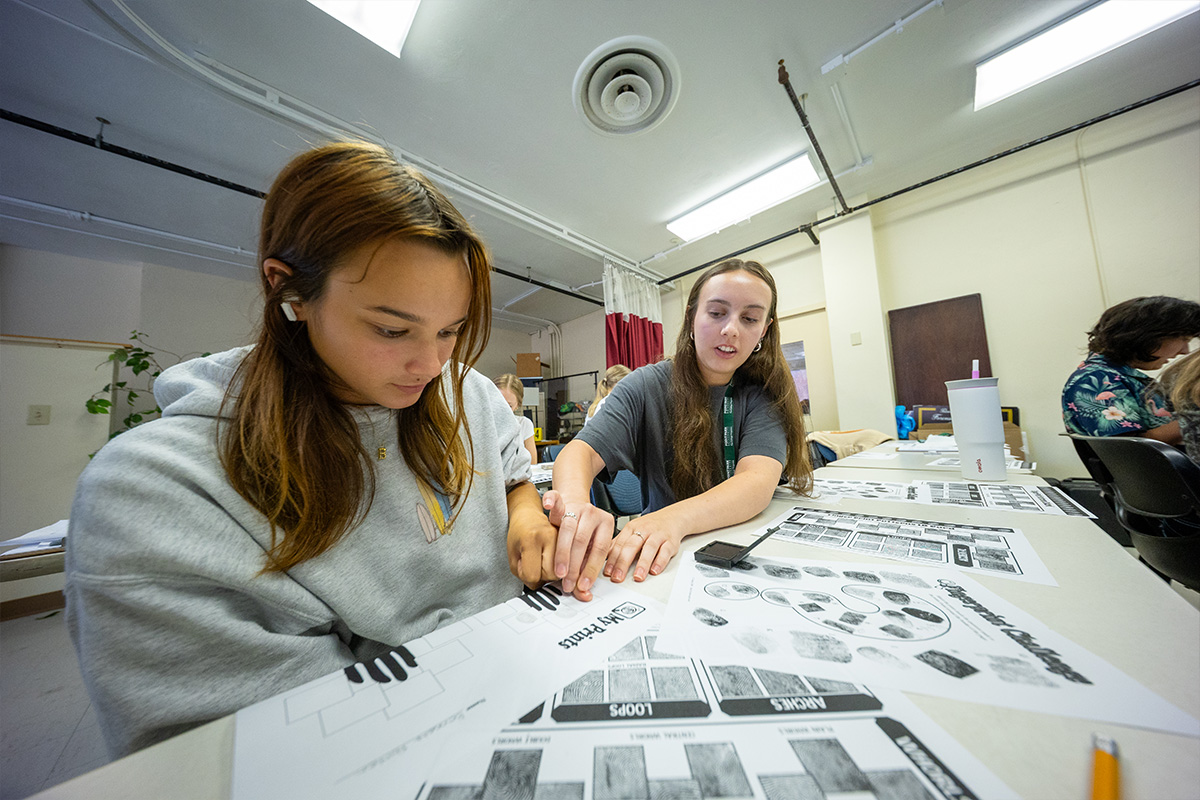 Students learn about fingerprinting at Point Park University.