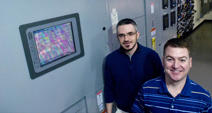 Electric engineering technology graduates Charles Frederick, left, and Eric Carper have started new jobs at Eaton Corp. | Photo by Christopher Rolinson
