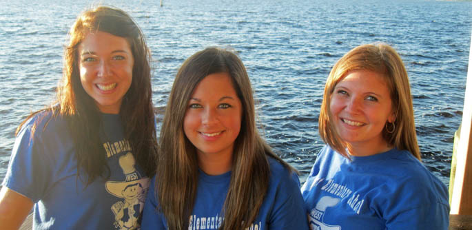 Pictured left to right are education alumni Jasmin Hain, Kelly Cortazzo, and Elisabeth Jensen.