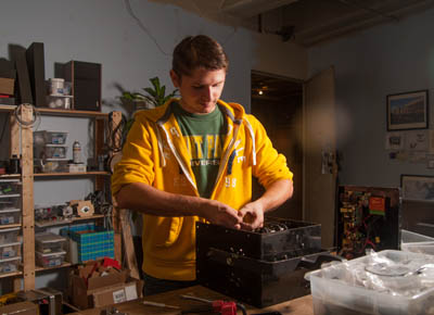 Pictured is Jacob Rumski, Point Park mechanical engineering technology student and intern for Trinculo's Attic. | Photo by Chris Rolinson