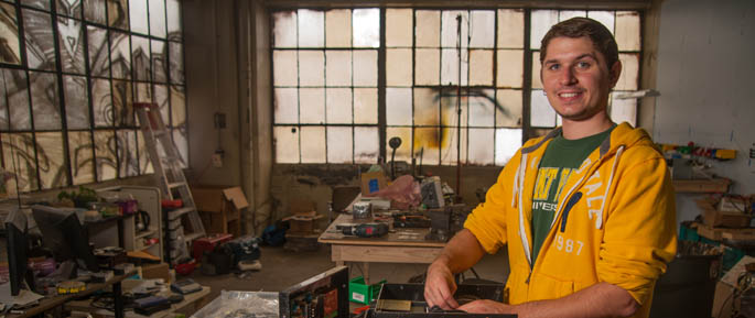 Pictured is Jacob Rumski, Point Park mechanical engineering technology student and intern for Trinculo's Attic. | Photo by Chris Rolinson