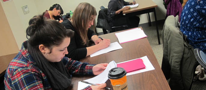 Pictured are Point Park English/creative writing majors in a master class with poet Marcus Wicker. | Photo by Amanda Dabbs