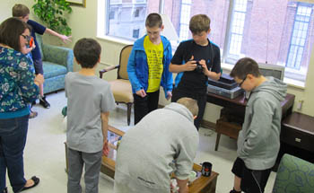 Pictured are fifth and sixth grade students at Point Park's crime scene investigation house. | Photo by Mary Cvetan