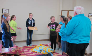 Pictured are fifth and sixth grade students at Point Park's crime scene investigation house. | Photo by Mary Cvetan