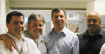 Pictured left to right are four Point Park engineering alums who work for FedExGround: Gene Price, Dean Bonenberger, Bill Paoleschi and Chas Ainsworth.