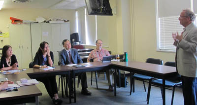 Pictured is Richard Gutkind, Ph.D., graduate education professor, presenting to educators from Singapore. | Photo by Amanda Dabbs