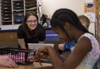 As part of her field experience, a Point Park special education major works with young students at The Watson Institute.