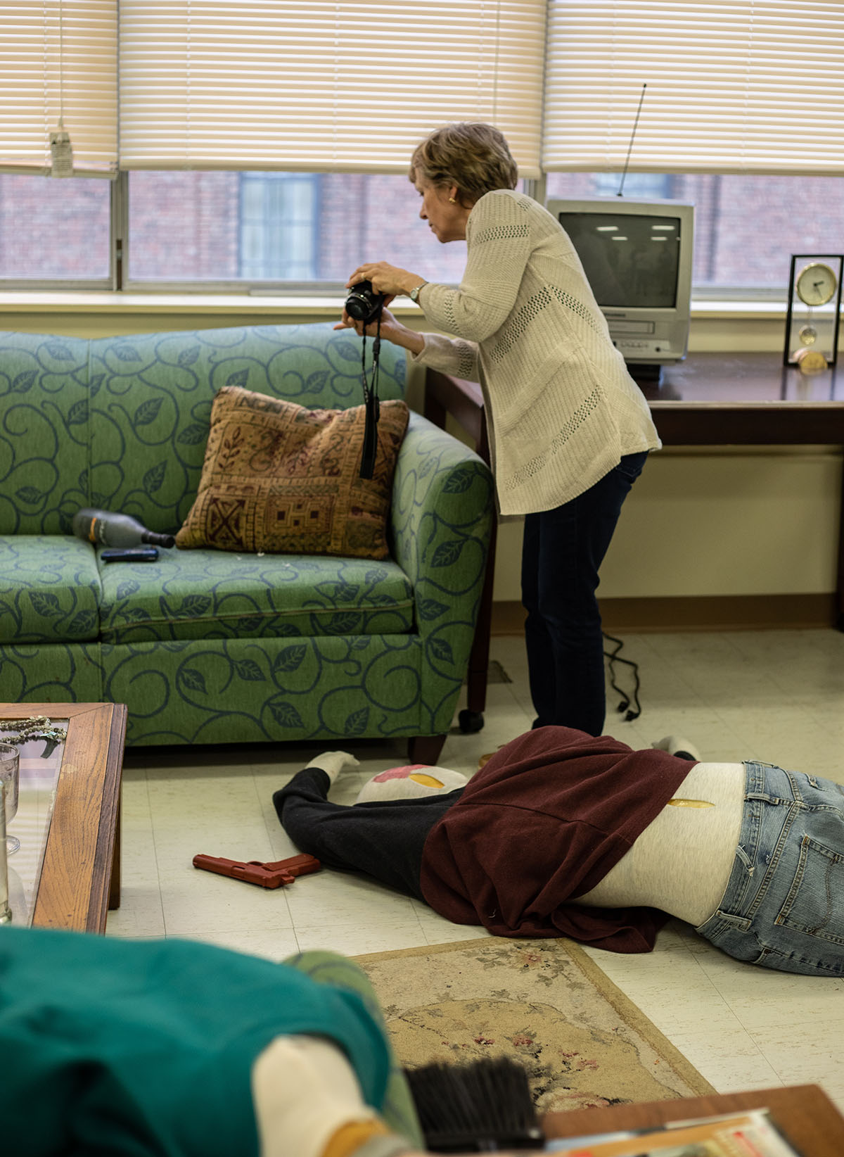 Pictured are members of the Hampton Township Citizens Police Academy at Point Park University's CSI House. Photo by Hannah Johnston.