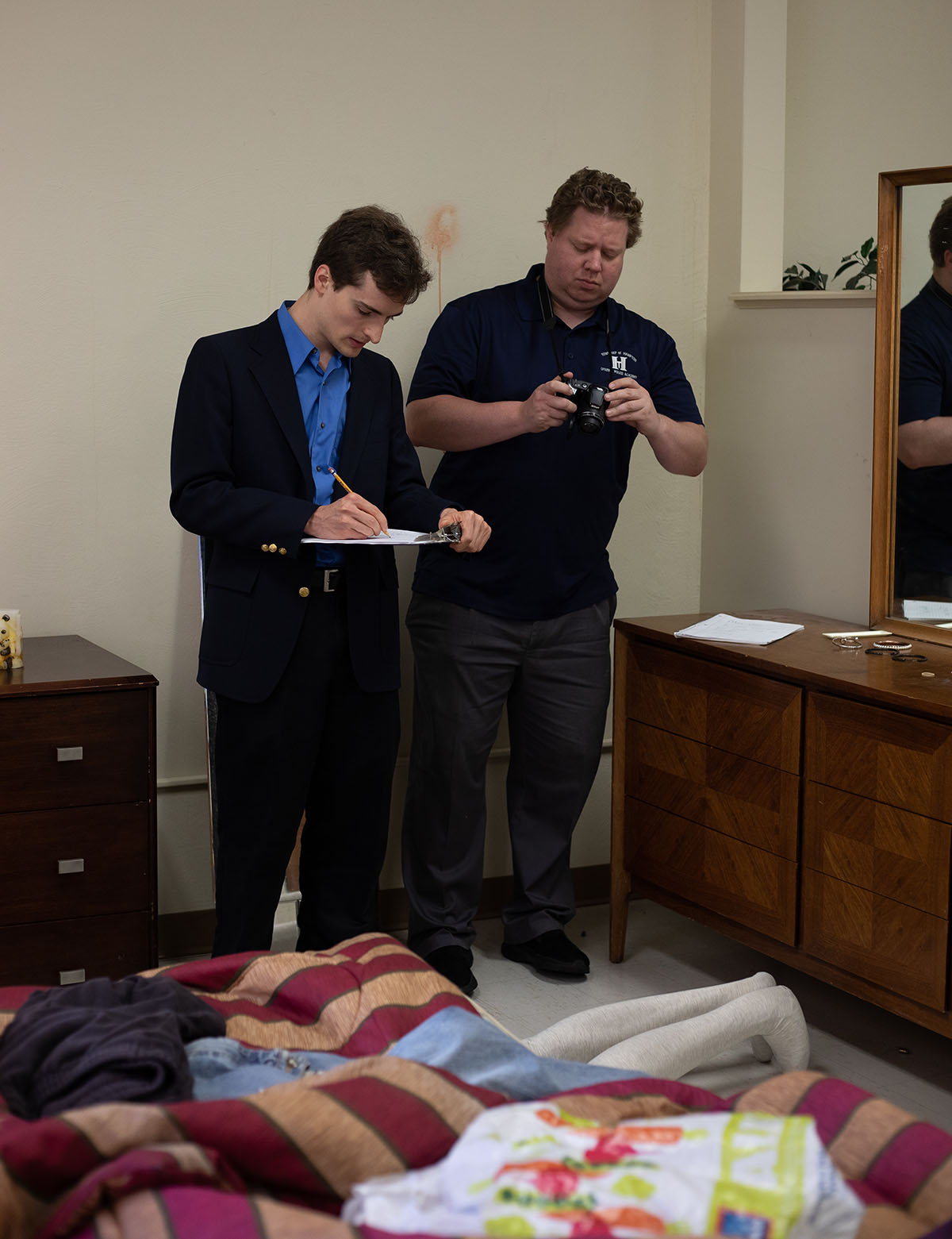 Pictured are members of the Hampton Township Citizens Police Academy at Point Park University's CSI House. Photo by Hannah Johnston.