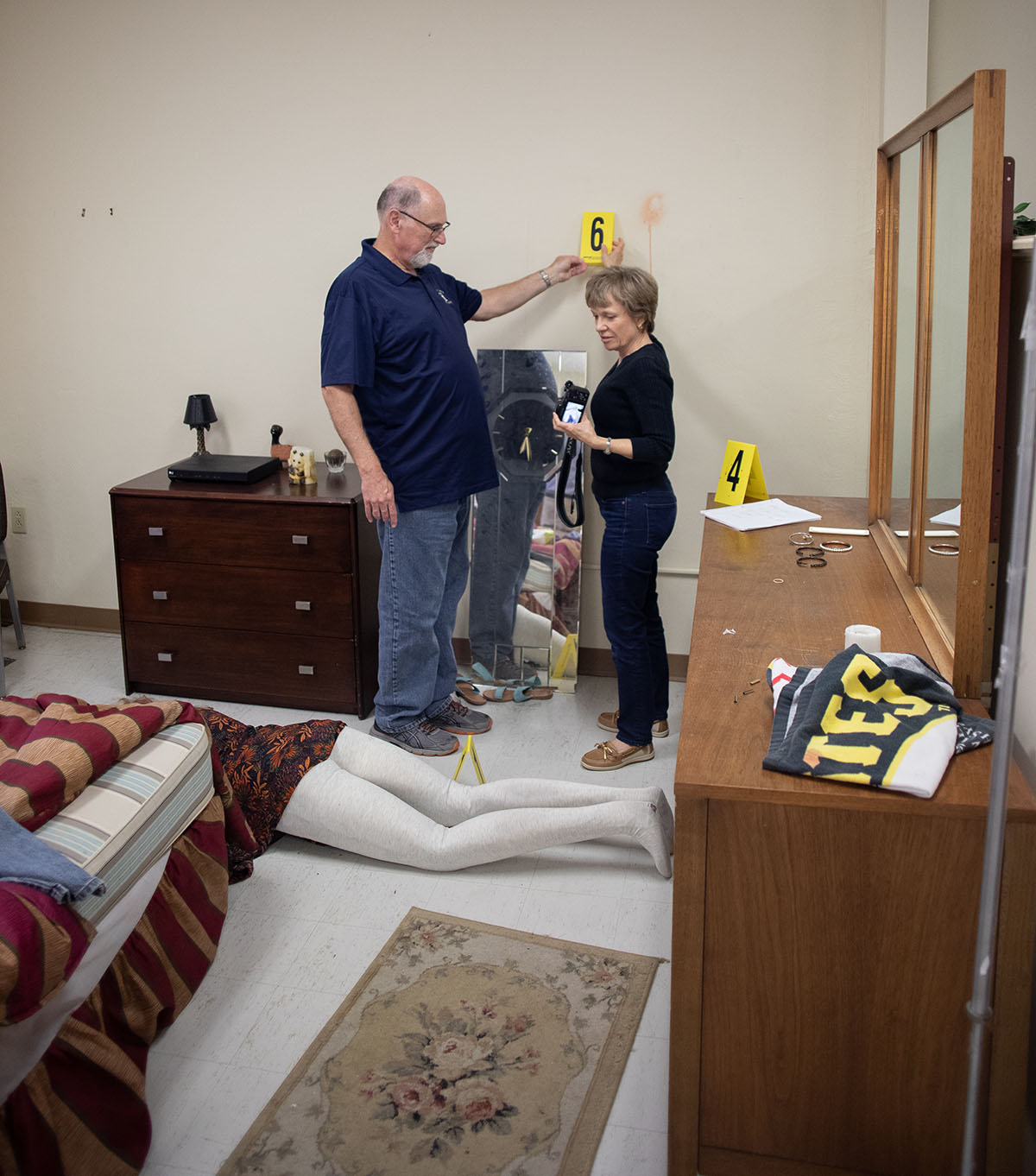 Pictured are members of the Hampton Township Citizens Police Academy at Point Park University's CSI House. Photo by Hannah Johnston.