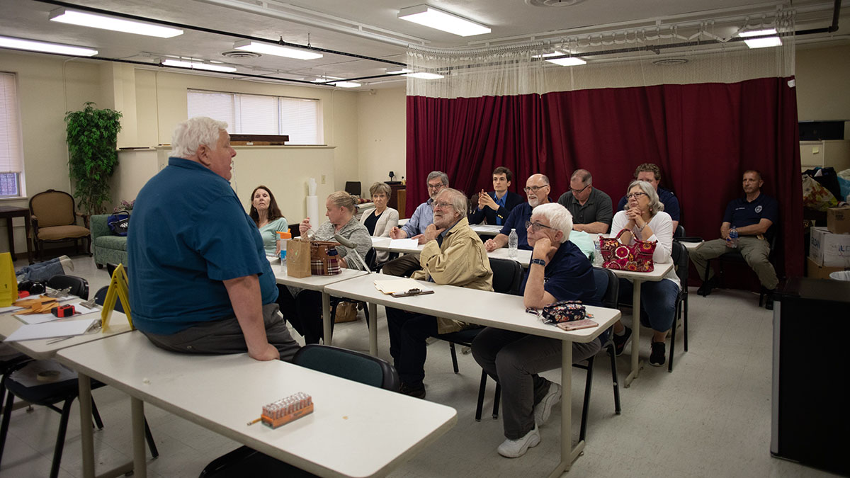 Pictured are members of the Hampton Township Citizens Police Academy at Point Park University's CSI House. Photo by Hannah Johnston.