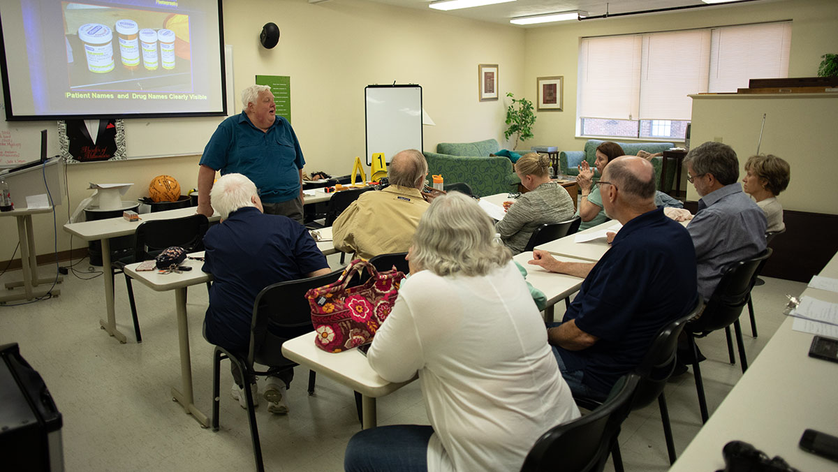 Pictured are members of the Hampton Township Citizens Police Academy at Point Park University's CSI House. Photo by Hannah Johnston.