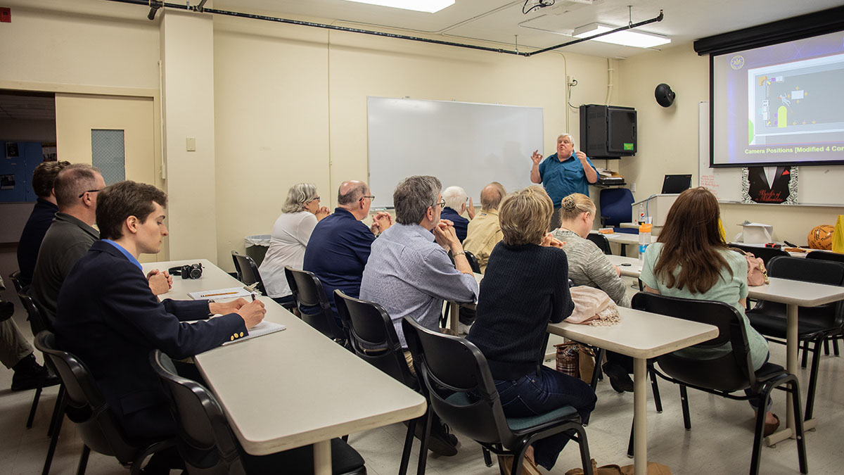 Pictured are members of the Hampton Township Citizens Police Academy at Point Park University's CSI House. Photo by Hannah Johnston.