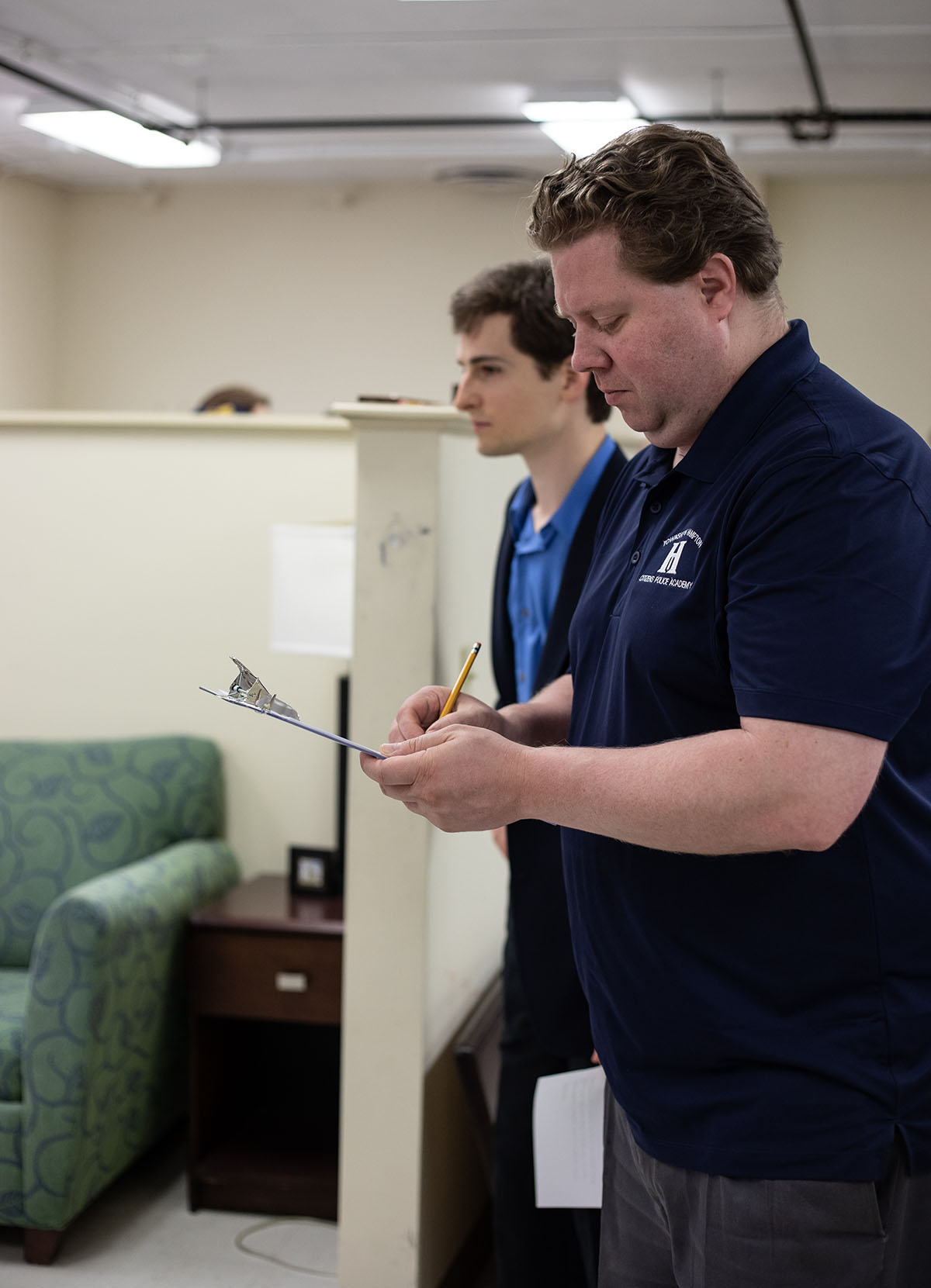 Pictured are members of the Hampton Township Citizens Police Academy at Point Park University's CSI House. Photo by Hannah Johnston.