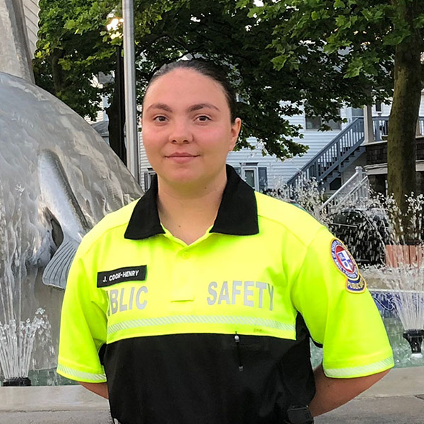 A student raises their hand as Jessica Weiber, a police officer from Ocean City, Maryland, points to them to answer a question.