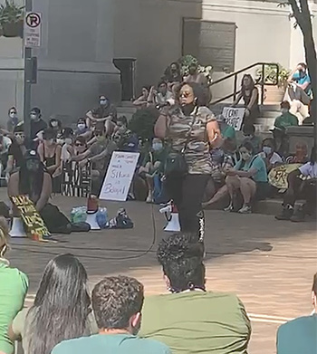 Pictured is Psy.D. student Kimberly Crawford-Champion speaking at the Black, Young and Educated (B.Y.E.) Civil Saturdays Peaceful Protest.