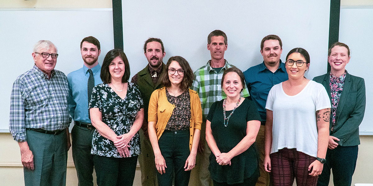 Pictured left to right in the front row are Jacqueline D’Amico, Keri Rouse, Rebekah Young and Zoe Zentner and in the back row left to right are Dr. John Kudlac, Alexander Suleski, Joseph Ludington, Dr. Matthew Opdyke, John Belinda and Kaitlyn Robson. Photo by Emma Federkeil.