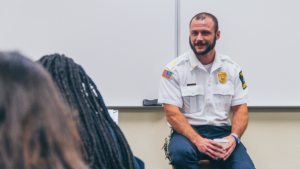 Pictured is Major Adam Smith from the Allegheny County Jail talking with criminal justice students. Photos by Emma Federkeil.