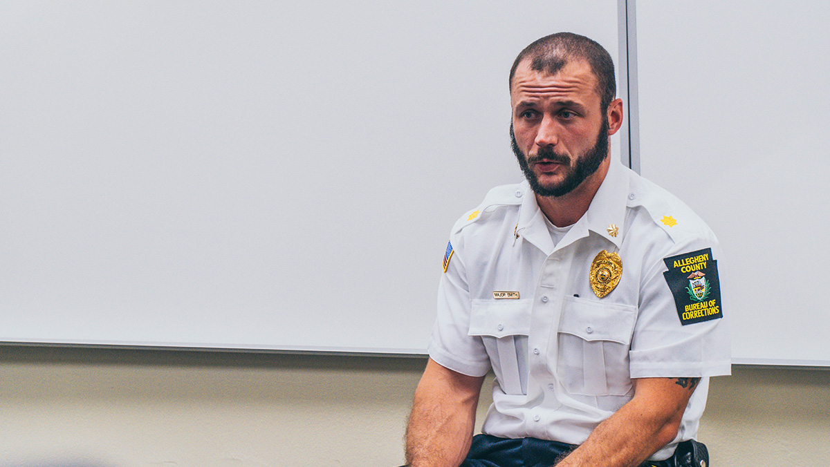 Pictured is Major Adam Smith from the Allegheny County Jail talking with criminal justice students. Photos by Emma Federkeil.