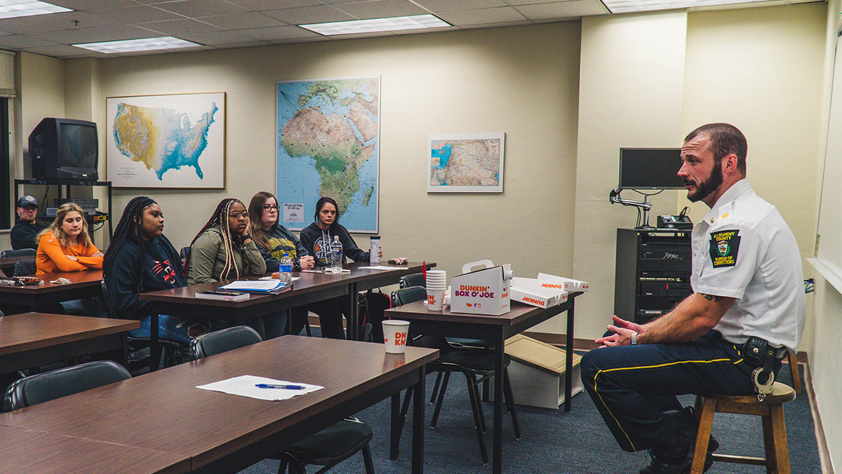 Pictured is Major Adam Smith from the Allegheny County Jail talking with criminal justice students. Photos by Emma Federkeil.