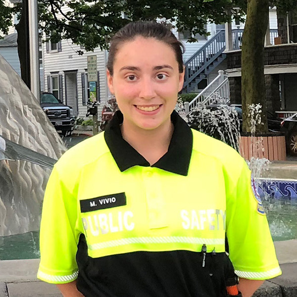 A student raises their hand as Jessica Weiber, a police officer from Ocean City, Maryland, points to them to answer a question.