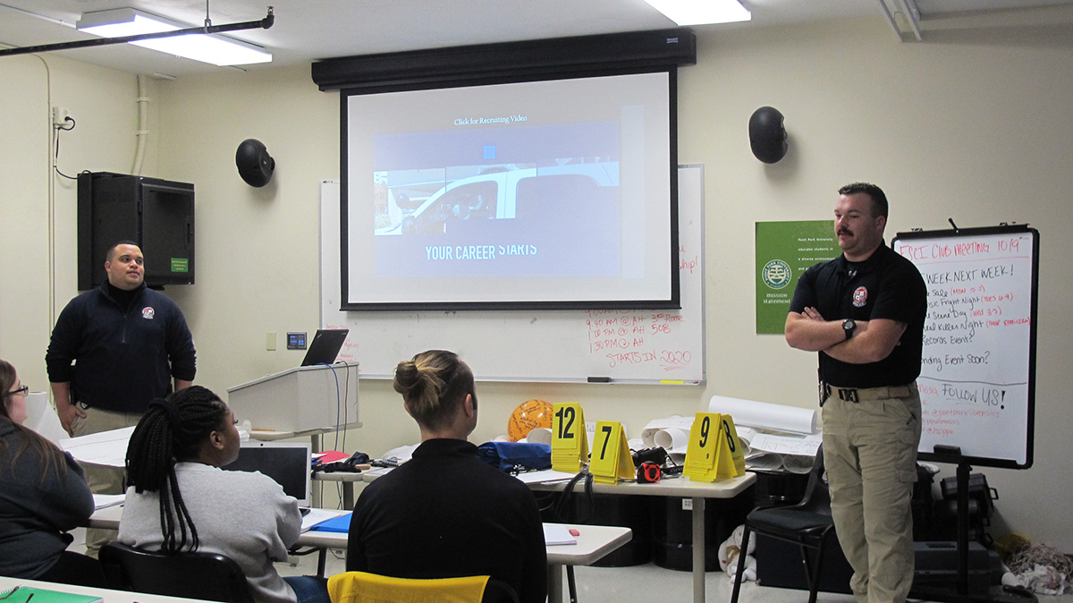 Pictured are Ocean City Police Department officers presenting at Point Park University. Photo by Amanda Dabbs