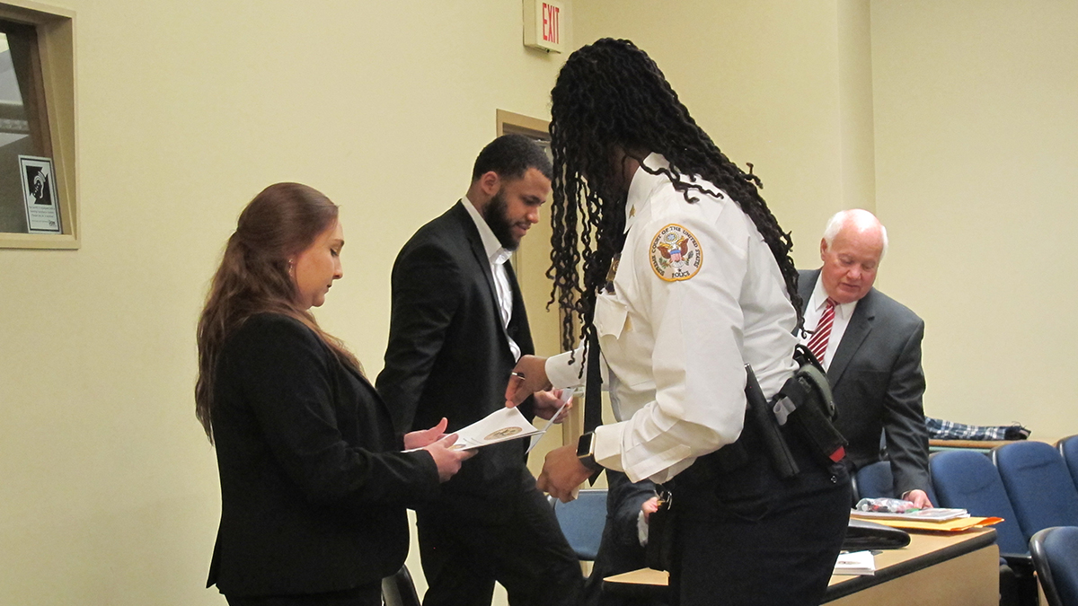 Pictured are U.S. Supreme Court Police Sergeants Charmaine Carr and Mark Hosier with Point Park criminal justice students. Photo by Amanda Dabbs