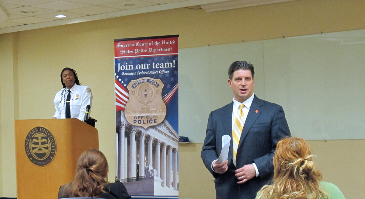 Pictured are U.S. Supreme Court Police Sergeants Charmaine Carr and Mark Hosier with Point Park criminal justice students. Photo by Amanda Dabbs