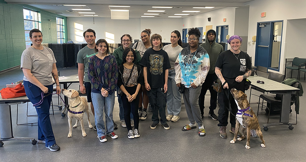 Pictured are students with North Side Humane Animal Rescue staff. Photo by Nicole Chynoweth.