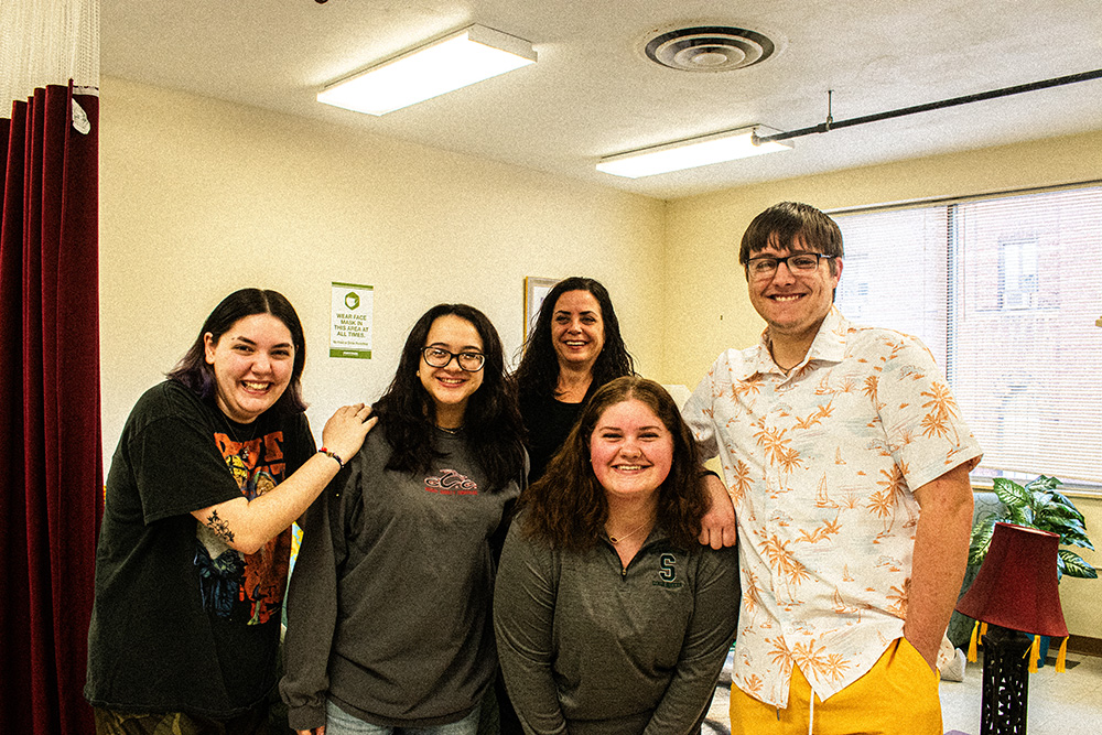 Pictured are students with Professor Christine Secilia. Photo by Angelina Caceres.