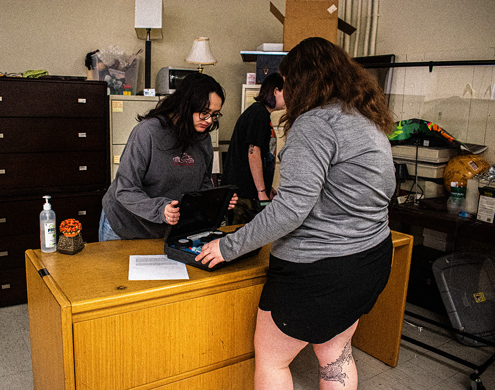 Pictured are students in the CSI House. Photo by Angelina Caceres.