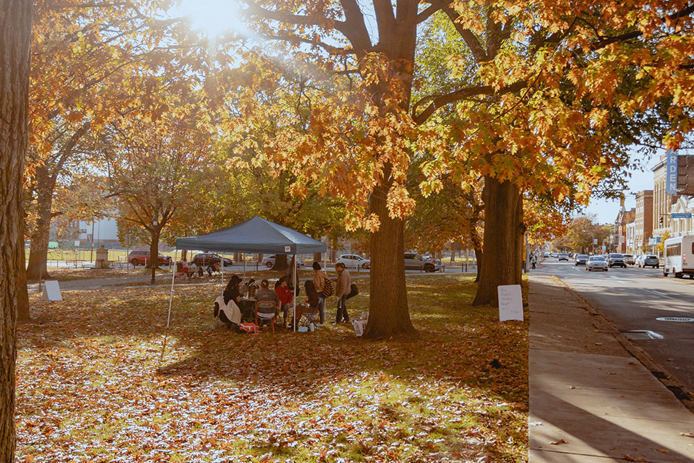 Pictured are Point Park psychology students holding a Mobile Thriving Respite event on the Northside in Allegheny Commons Park. Photo by Ethan Stoner. 