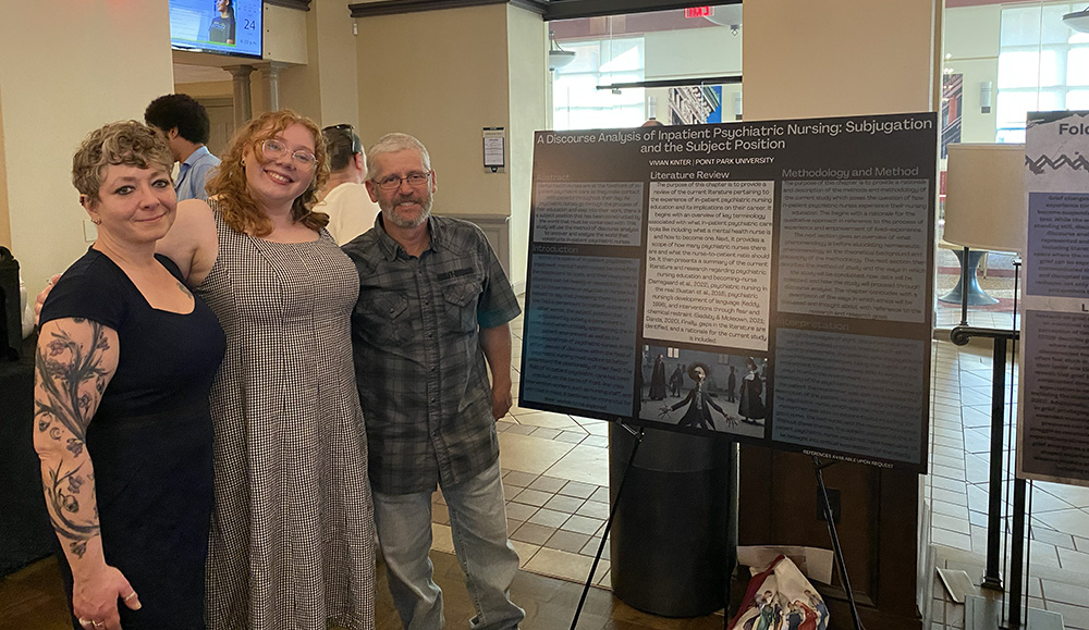 Pictured is Vivian Kinter and her family at the Psychology Qualitative Research Symposium. Photo by Nicole Chynoweth.