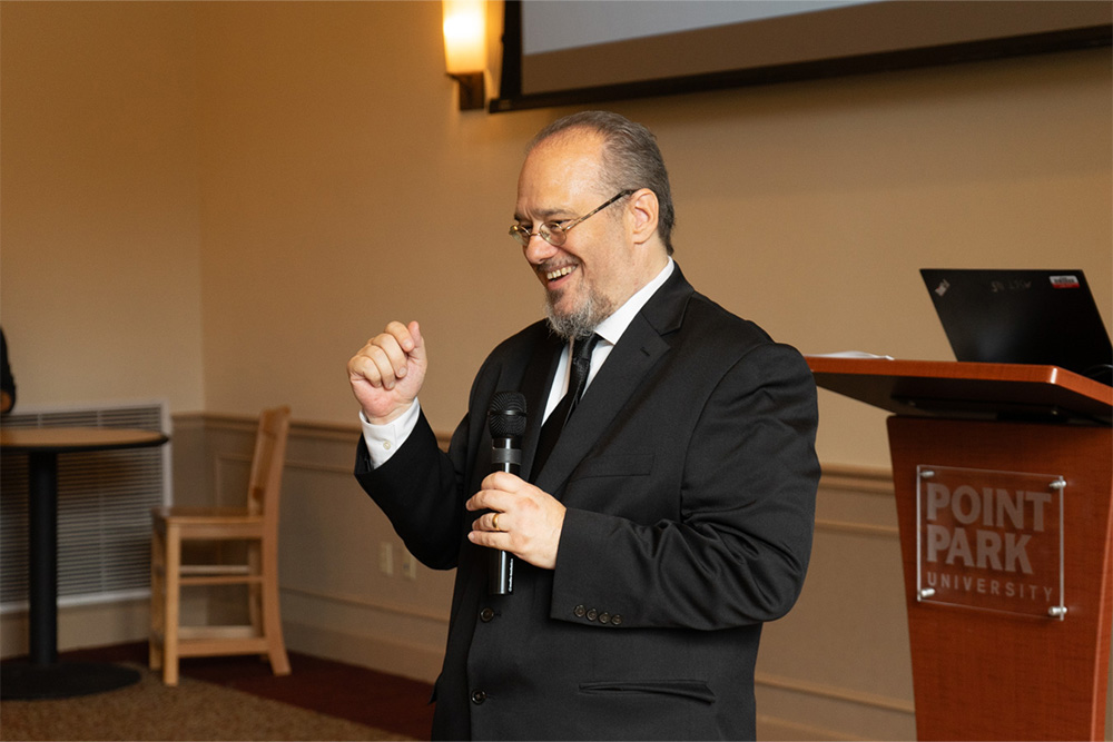 Brent Robbins speaks in front of a Point Park University podium on Sept. 17, 2025.