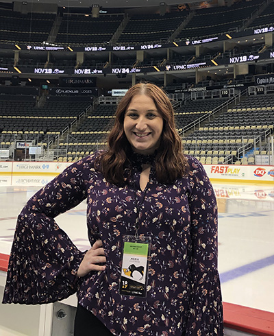 Pictured is SAEM alumna Brittany Bishop at PPG Paints Arena.