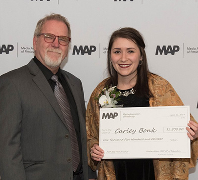 Pictured is journalism student Carley Bonk and Professor Tim Hudson. Photo submitted by Beal.