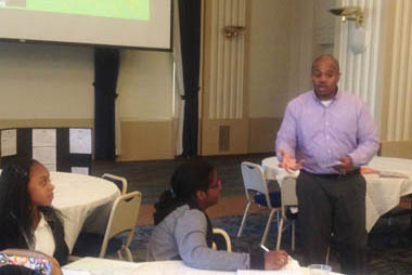 Pictured is one of the BOLD mentors talking to students. | Photo submitted by Dr. Herman Reid.