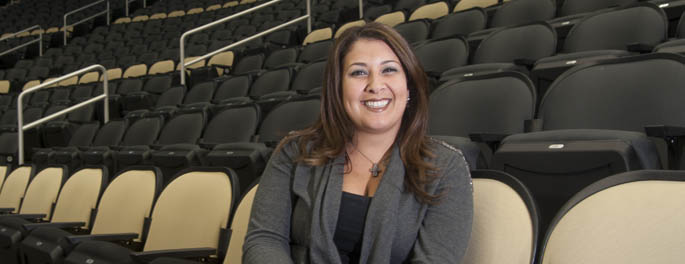 Pictured is MBA alum Jennifer Bullano, director of communications for the Pittsburgh Penguins.