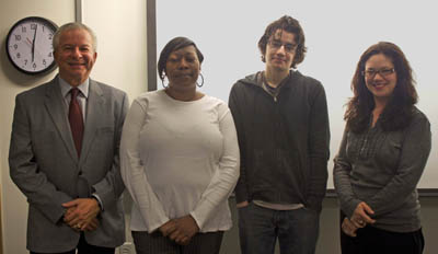 Pictured are second place winners of the Business Plan Contest Mia Everett, Charles Dominick, and Kimberly Trevors with School of Business adjunct faculty member Michael Brna, Ph.D.