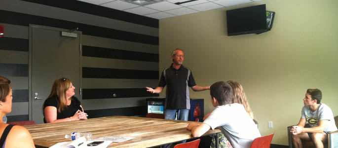 Pictured is Professor Ed Traversari speaking at the SAEM 2014 Summer Workshop. | Photo by Amanda Dabbs