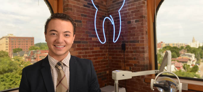 Pictured is M.B.A. alumnus Michael Mann, a business manager for Dr. Bobbie L. Hawranko's dental practice in Shadyside Pittsburgh. | Photo by Jim Judkis
