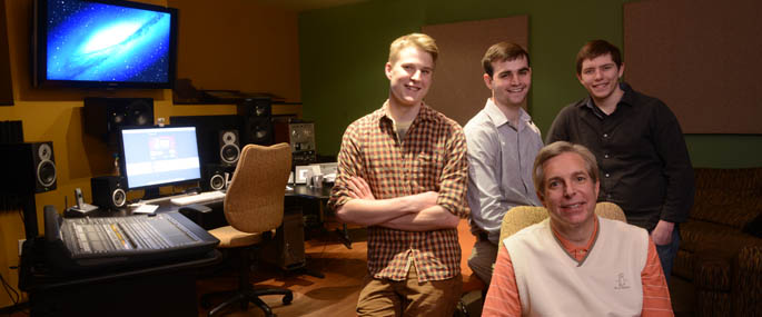 Pictured left to right are Point Park students Jayme Jennings, Craig Woolridge and Evan Schall with New Perspective president and Point Park adjunct instructor Dick Roberts. | Photo by Jim Judkis