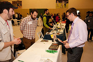 Students meet with local organizations at campus-based career event.