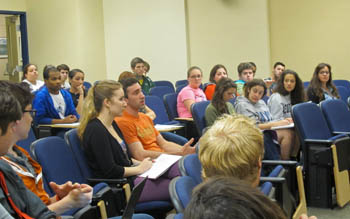 Pictured is a Point Park University student asking a question to Broadway actor Ben Lipitz. | Photo by Amanda Dabbs